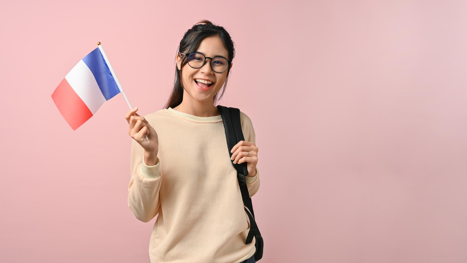 French translator holding a french flag