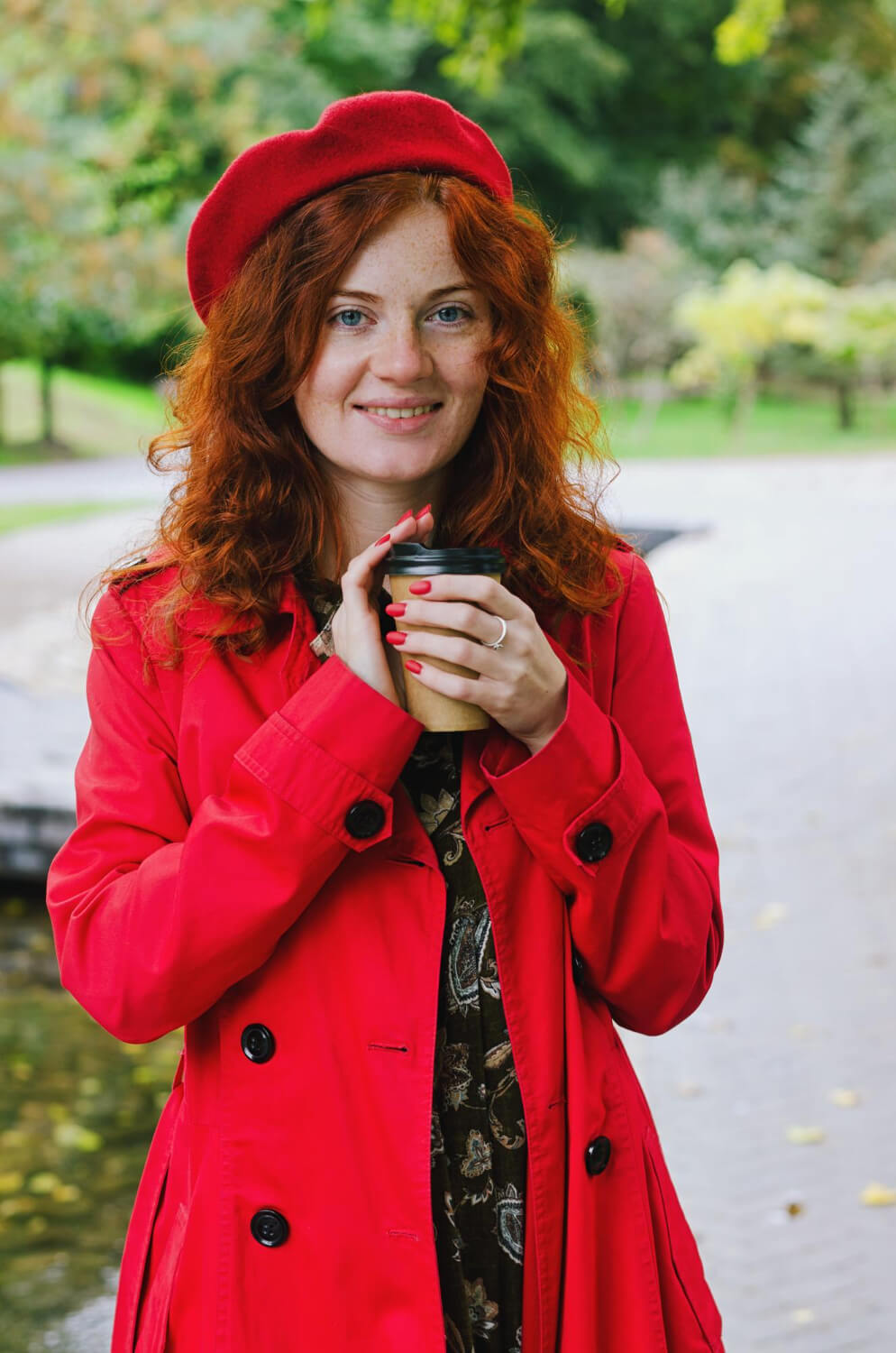 Swedish Translator holding a cup of coffee